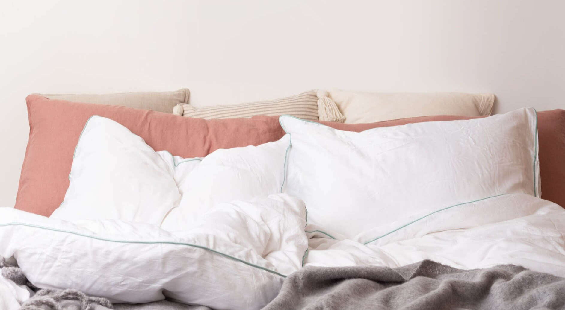 picture of bamboo bedding from the front with pillows and cushions